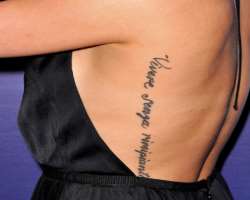 Her tattoo which was supposed to say “Live without regrets” in Italian was misspelled.